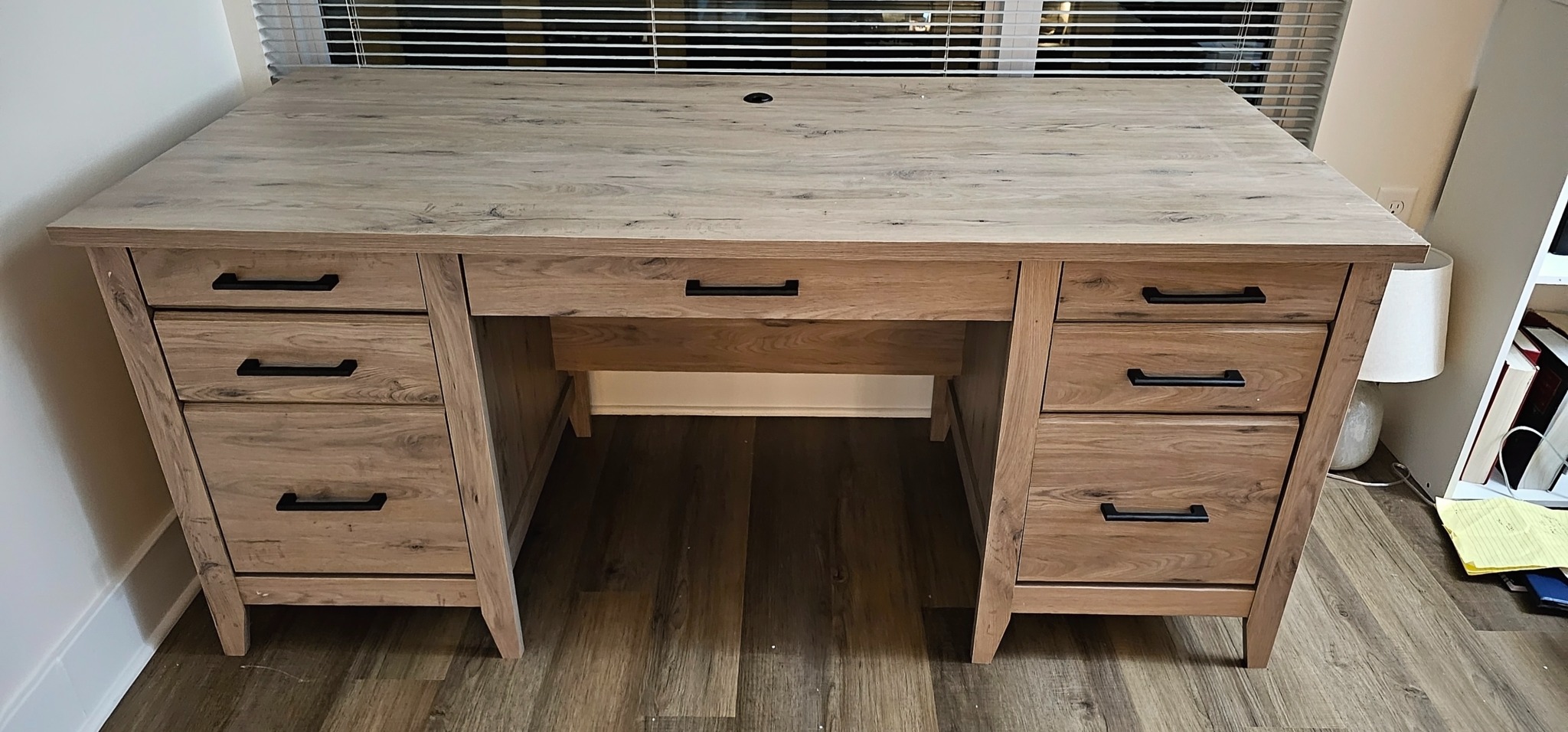 Finished wood desk with drawers